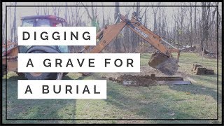 Digging a grave for a burial at a cemetery [upl. by Yelats]