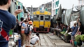 Maeklong Railway Market  Bangkok Thailand [upl. by Setsero]